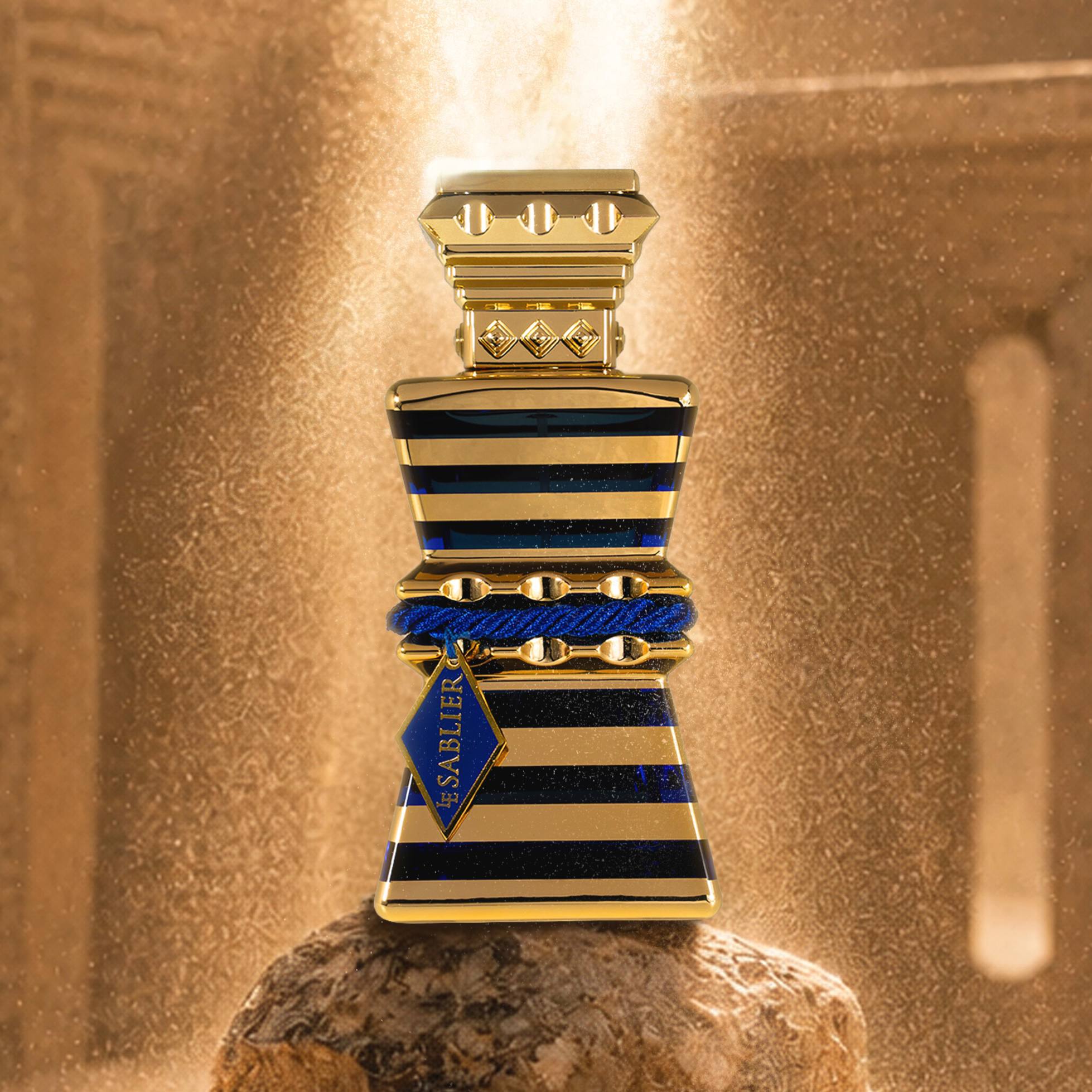 Pharaon extrait bottle with golden sand
