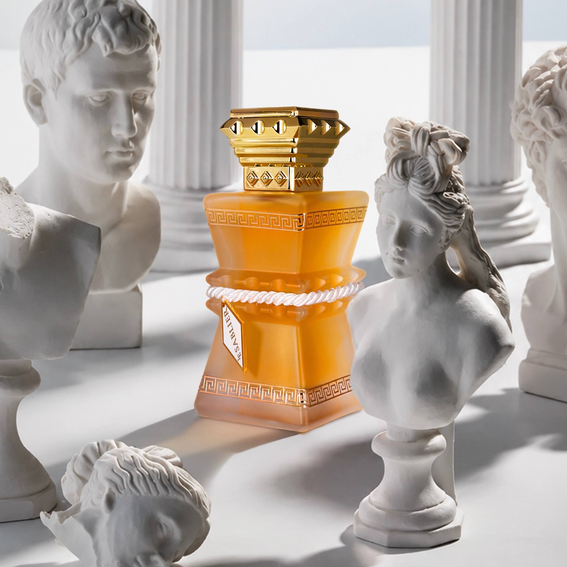 Zeus bottle surrounded by classical busts